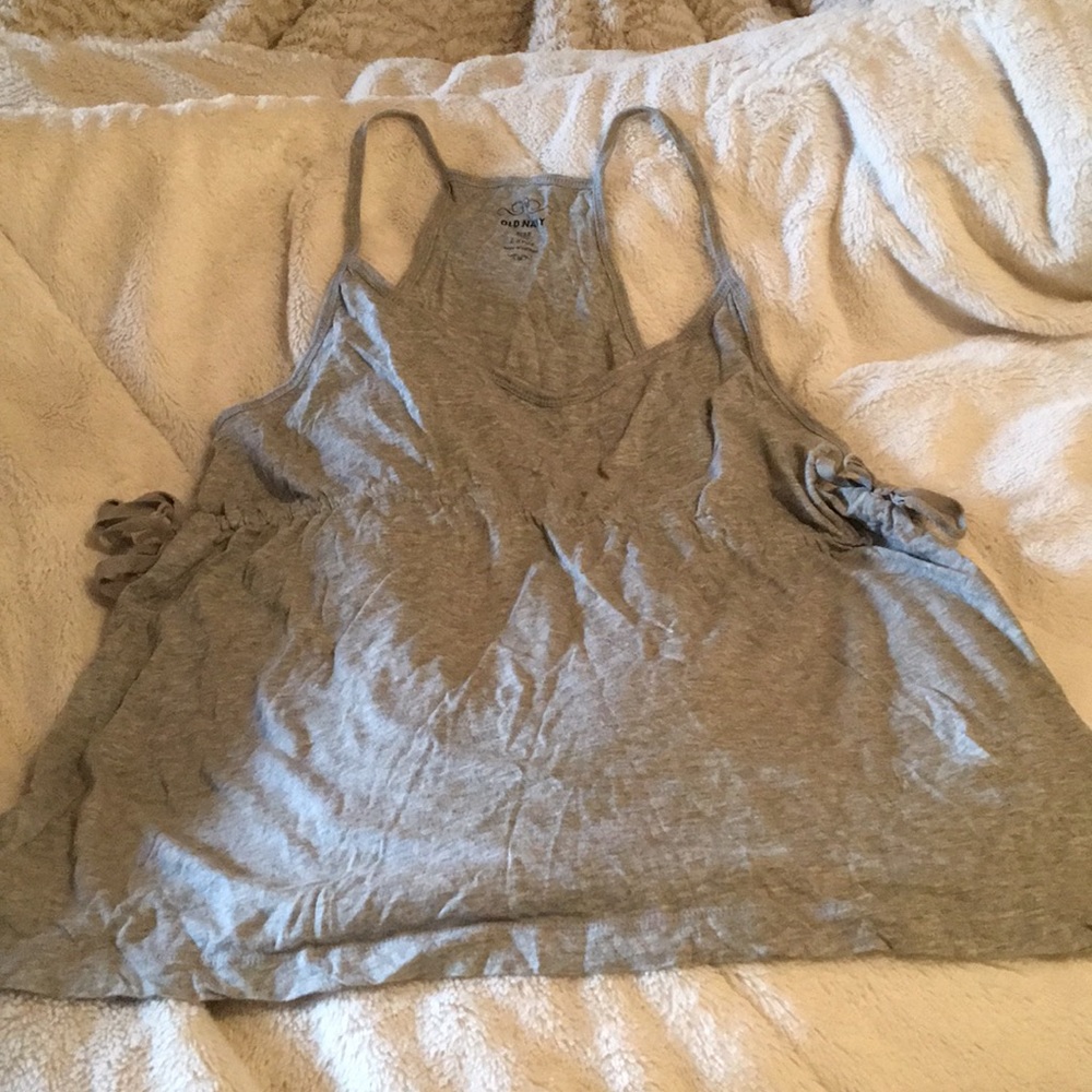 Tank with ties on sides